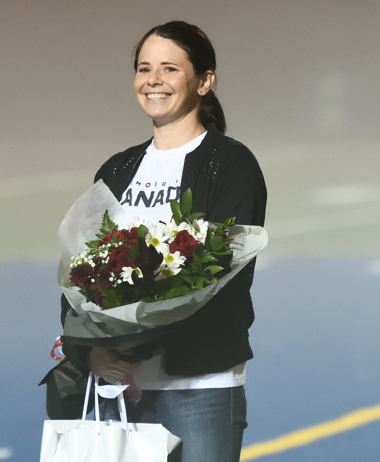 Diana Matheson set to make a big impact in 2023 | Canadian Olympic soccer hero receives a bouquet at an honourary ceremony in 2022. | Pierce Lang